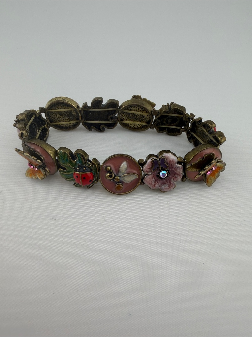 Vintage Pink Enamel Garden Charm Bracelet with Floral and Insect Accents